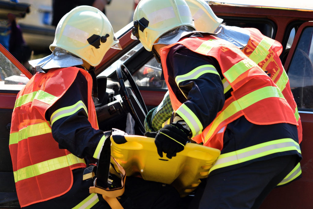 Photo of Firefighters Rescuing Accident Victims